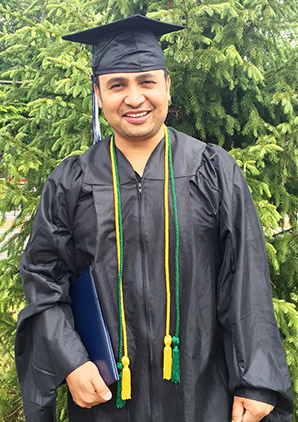 Photo of a man in a graduation gown